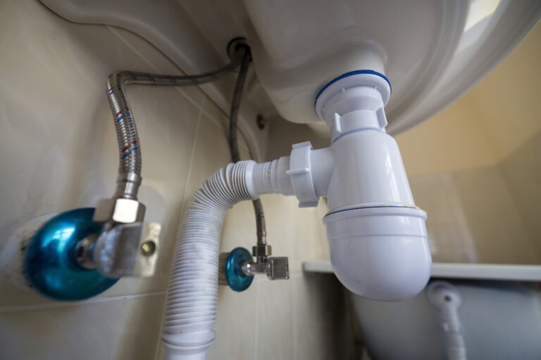 Affordable Plumbing / Bottom view of new white washbasin